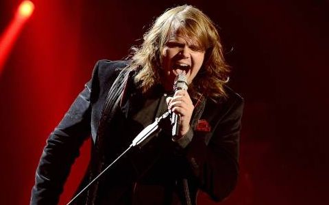 Caleb Johnson performs on American Idol 2014