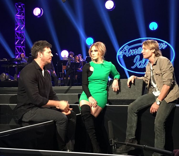 Idol Judges chat by the stage